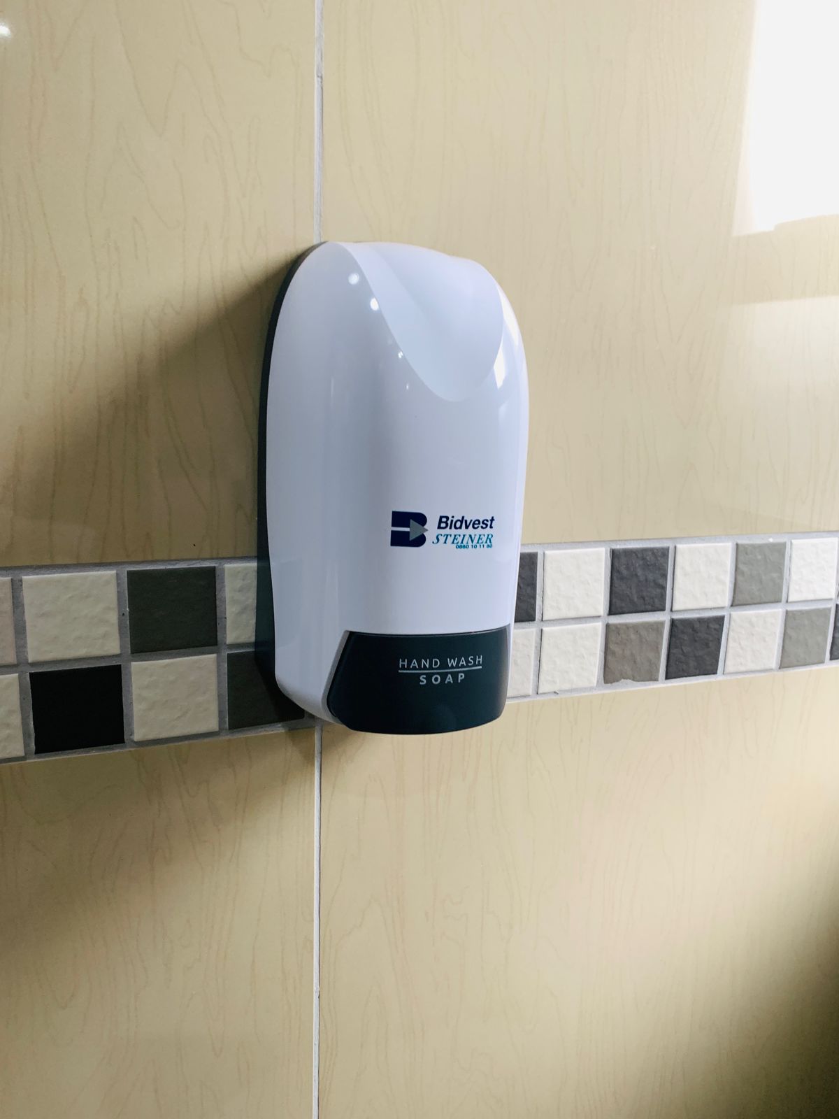 Hand sanitizer station for guest hygiene and safety