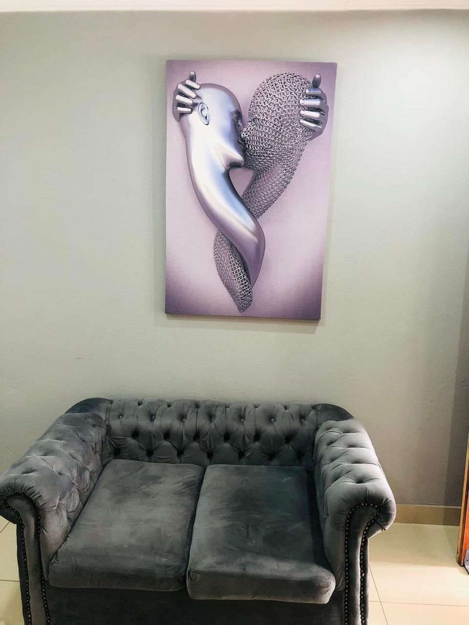 Comfortable couch area in standard room for relaxation