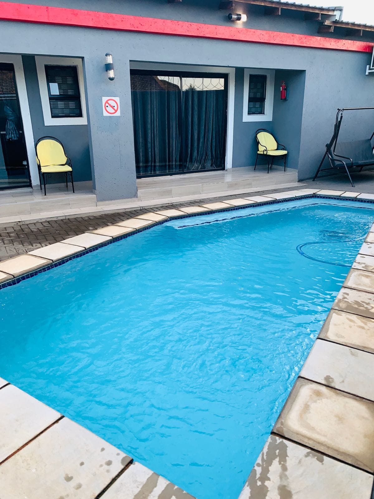 Swimming pool view from VIP room at Black Rose Guest House